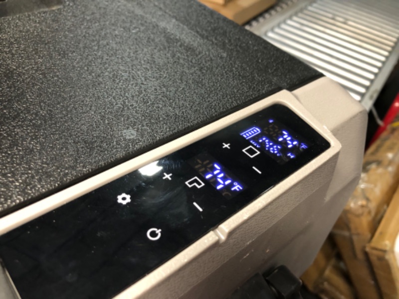 Photo 1 of ***MAJOR DAMAGE - WHEEL BROKEN OFF - POWERS ON - UNABLE TO TEST FURTHER - NO PACKAGING - SEE PICTURES***
Alpicool T60 Dual Temperature Control 12 Volt Refrigerator 63 Quart Portable Car Fridge Freezer (-4°F~68°F) for Truck, RV, Boat, Camping and Travel