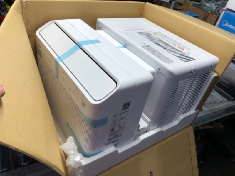 Photo 1 of ***USED - POWERS ON - UNABLE TO TEST FURTHER***
Midea 10,000 BTU U Shaped Smart Inverter Window Air Conditioner, Cools up to 450 Sq. Ft.,Ultra Quiet with Open Window Flexibility, Works with Alexa/Google Assistant, 35% Energy Savings, Remote Control