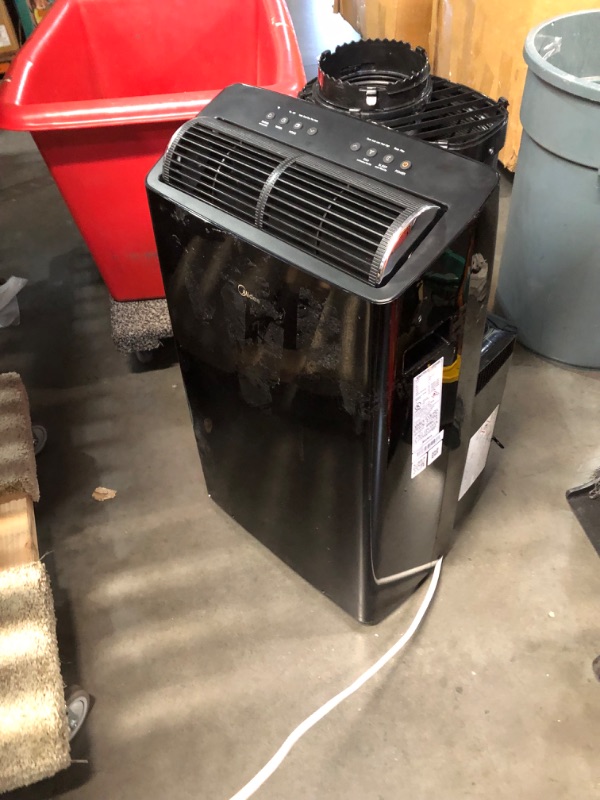 Photo 1 of ***USED - POWERS ON - UNABLE TO TEST FURTHER - NO PACKAGING - LIKELY MISSING PARTS***
Midea Duo 14,000 BTU (12,000 BTU SACC) High Efficiency Inverter Ultra Quiet Portable Air Conditioner, with Heat up to 550 Sq. Ft., Works with Alexa/Google Assistant, wit