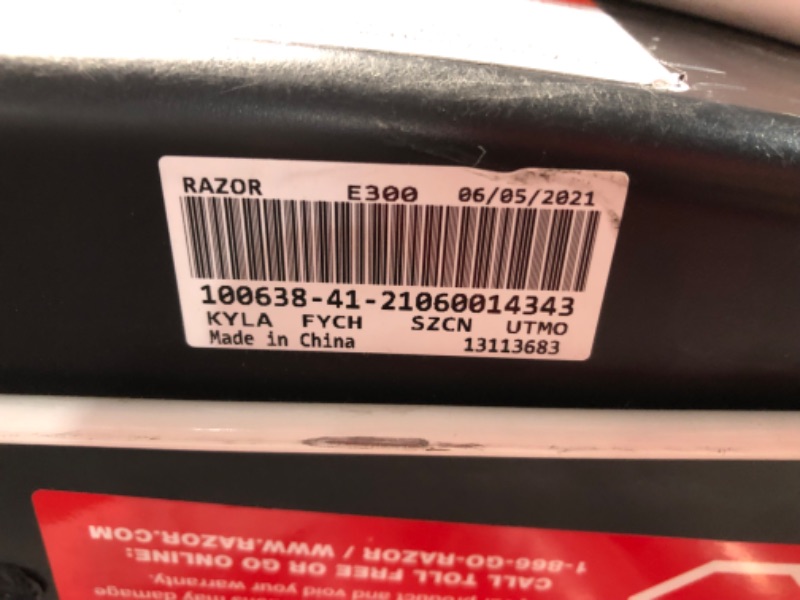 Photo 1 of (PARTS) (NOT FUNCTIONAL) Razor E300 Electric Scooter for Kids Ages 13+ - 9" Pneumatic Tires, Up to 15 mph and 40 min of Ride Time, For Riders up to 220 lbs