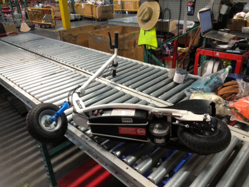 Photo 1 of (PARTS) (NOT FUNCTIONAL) Razor E300 Electric Scooter for Kids Ages 13+ - 9" Pneumatic Tires, Up to 15 mph and 40 min of Ride Time, For Riders up to 220 lbs