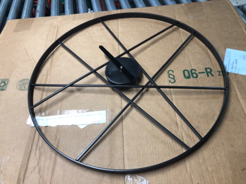 Photo 1 of ***DAMAGED - ARMS RIPPED OFF - SEE PICTURES***
CosmoLiving by Cosmopolitan Metal Open Frame Round Wall Clock, 24" x 2" x 24", Black