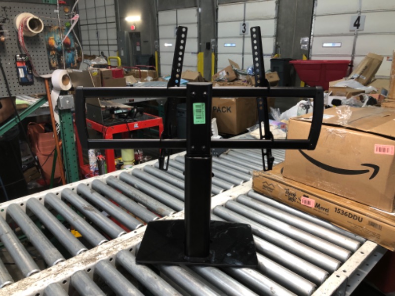 Photo 1 of ***DAMAGED - CHIPPED - NO PACKAGING - INCOMPLETE - SEE PICTURES***
Universal Swivel TV Stand/Base Table Top TV Stand 32 to 65 inch TVs 80 Degree Swivel, 4 Level Height Adjustable, Heavy Duty Tempered Glass Base, Holds up to 88lbs Screens, HT04B-002