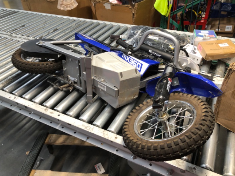 Photo 1 of ***USED - PLASTIC DAMAGED - DIRTY - DOESN'T POWER ON OR CHARGE - UNABLE TO TROUBLESHOOT***
Razor MX350 Dirt Rocket Electric Motocross Bike, Blue, 10-12 inches