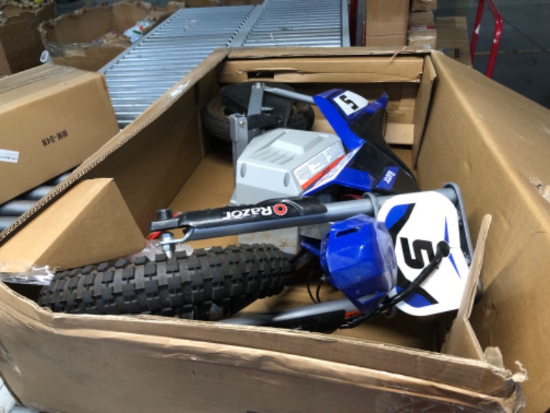 Photo 1 of ***USED - PLASTIC DAMAGED - DIRTY - DOESN'T POWER ON OR CHARGE - UNABLE TO TROUBLESHOOT***
Razor MX350 Dirt Rocket Electric Motocross Bike, Blue, 10-12 inches