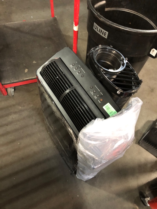 Photo 1 of ***DAMAGED - SEE PICTURES - POWERS ON - UNABLE TO TEST FURTHER - NO PACKAGING - LIKELY MISSING PARTS***
Midea Duo 14,000 BTU (12,000 BTU SACC) High Efficiency Inverter Ultra Quiet Portable Air Conditioner, with Heat up to 550 Sq. Ft., Works with Alexa/Goo