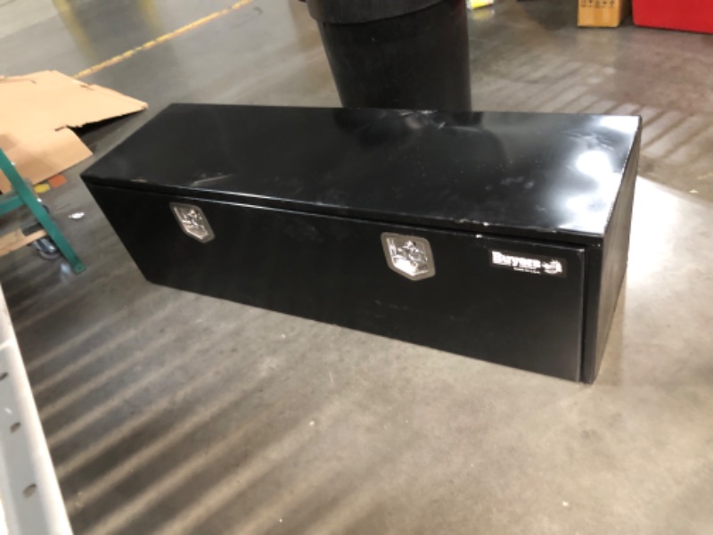 Photo 1 of ***MAJOR DAMAGE - COVERED IN DENTS - SEE PICTURES - NO PACKAGING***
Buyers Products 1702115 Steel Underbody Truck Box with Lockable Paddle Latch, 18x 18x 60 Inch, for Work/ Utility Truck, Heavy Duty Truck Bed Box, Made in the USA, Black
