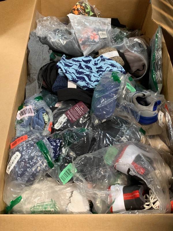 Photo 1 of **NELLIS APPAREL BOX** VARIOUS SIZES AND CONDITIONS