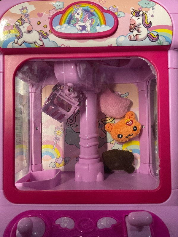 Photo 1 of ***MISSING MOST PLUSHIES AND CORD FOR MACHINE***
 Claw Machine for Kids,Unicorn Mini Vending Machines Candy Grabber Prize Dispenser Toys for Girls,Electronic Arcade Game with 20 Mini Plush Toys for Christmas Easter Birthday Gifts