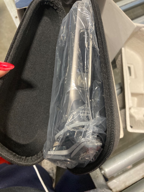 Photo 1 of Philips Norelco Shaver Series 9000, Wet and Dry Electric Shaver, with Lift & Cut Shaving System and SenseIQ Technology, Pop-up Trimmer, Cleaning Pod, Charging Stand and Travel Case, Model S9987/85