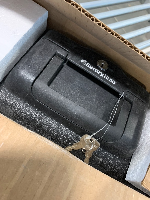 Photo 1 of SentrySafe Fireproof Money Safe with Key Lock, Black Lock Box with Portable Carrying Handle for Travel, Exterior: 14.3 in. W x 11.2 in. D x 6.1 in H, 1200