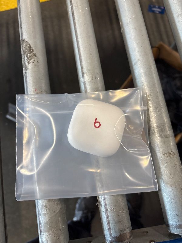 Photo 1 of *** Charging case only ***Beats Solo Buds - Wireless Bluetooth Earbuds | 18 Hours of Battery Life | Apple & Android Compatibility | Built-in Microphone - Transparent Red