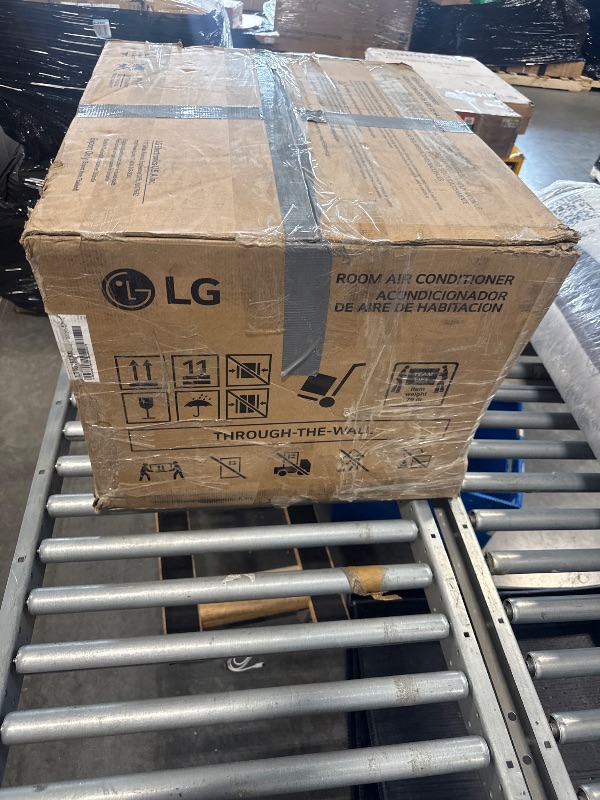 Photo 1 of ***PARTS ONLY***
LG 10,000 BTU Through the Wall Air Conditioner, 115V, Cools up to 440 Sq. Ft. for Bedroom, Living Room, Apartment, with Remote, 3 Cool & Fan Speeds, Wall AC Unit, White ***PARTS ONLY*****