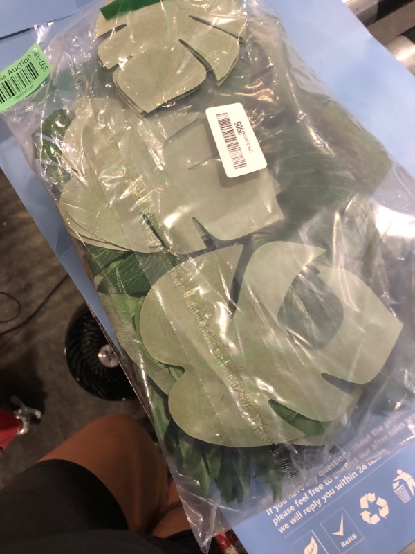 Photo 1 of 108 Pieces 7 Kinds Artificial Tropical Leaf Jungle Leaves Plant Safari Leaves Decorations Fake Palm Leaf with Stems for Hawaiian Luau Party Table Beach Birthday Wedding Theme Party Decorations