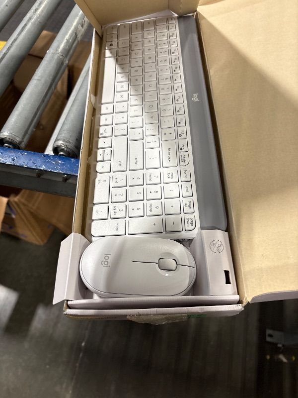 Photo 1 of Logitech MK470 Slim Wireless Keyboard and Mouse Combo - Modern Compact Layout, Ultra Quiet, 2.4 GHz USB Receiver, Plug n' Play Connectivity, Compatible with Windows - Off White. 