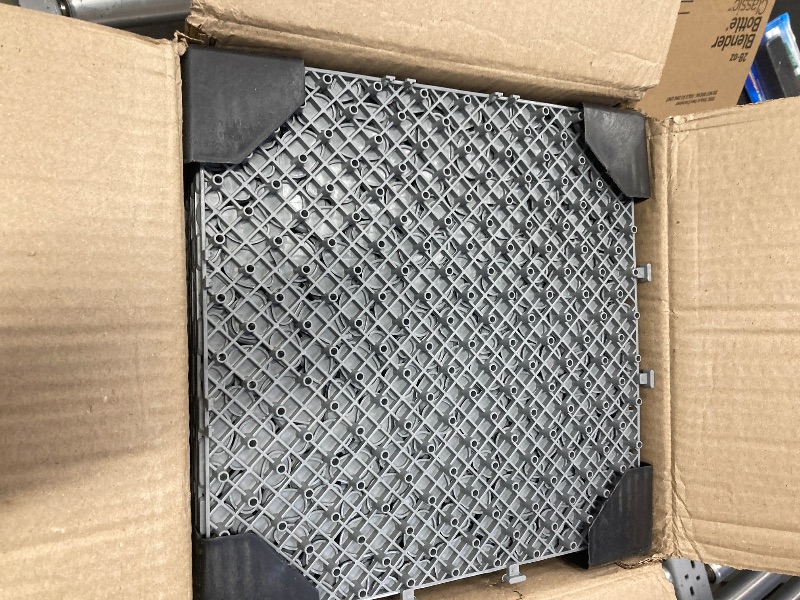 Photo 1 of 1 Ft. X 1 Ft. Gray Interlocking Deck Tiles PVC Waterproof Outdoor All Weather Anti-Slip Bathroom Shower Pack of 24
