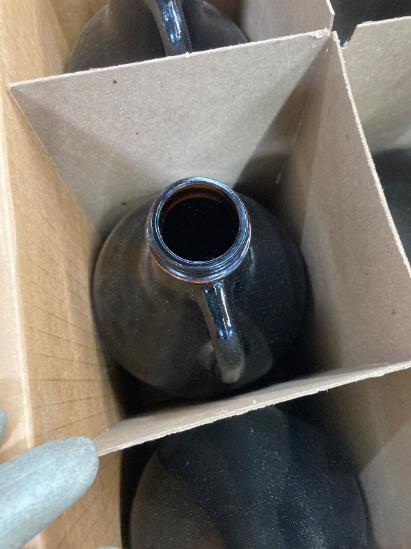 Photo 1 of 64 fl oz empty glass juggs (6 juggs)