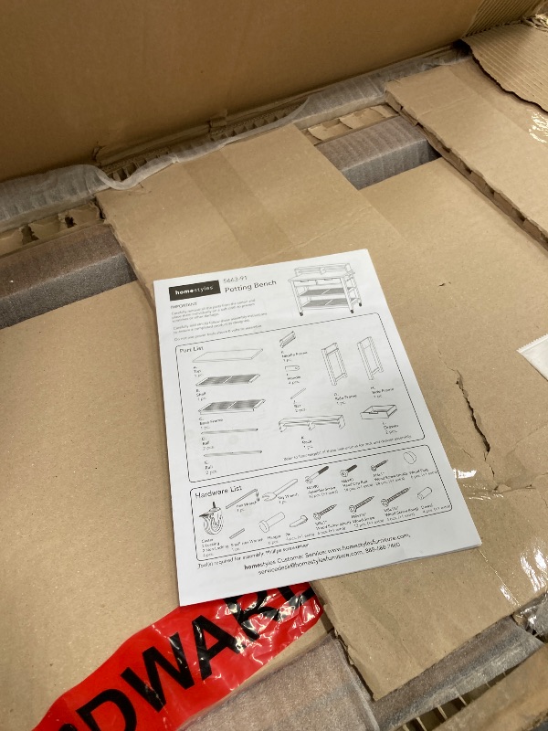 Photo 1 of Homestyles Maho Golden Teak Potting Bench