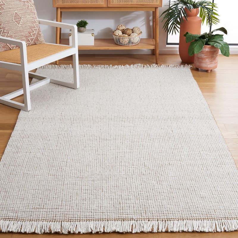 Photo 1 of **SIMILAR***SAFAVIEH Natural Fiber Collection Accent Rug - 3' x 5', Ivory & Natural, Handmade Woven Farmhouse Fringe Jute, Ideal for High Traffic Areas in Entryway, Living Room, Bedroom (NF826A)
