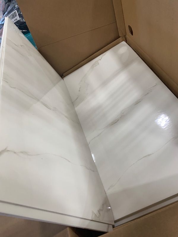 Photo 1 of 10pcs 23.6"x11.8" Marble Peel and Stick Waterproof Wall Panels (19.4 Sq. Ft. Coverage) - Heat-Resistant Backsplash Tile, PVC Wall Panels for Kitchen, Bathrooms, Living Rooms, Bedrooms, and TV Walls