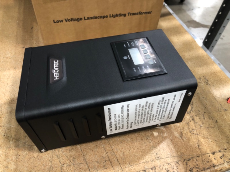 Photo 1 of HIBOITEC 600W Low Voltage Landscape Transformer, Outdoor Lighting Transformer with Photocell Sensor and Timer, 120V AC to 12V/15V AC Weatherproof Transformers for Landscape Lighting Path Lights