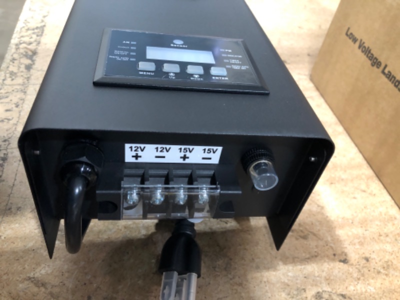 Photo 1 of HIBOITEC 600W Low Voltage Landscape Transformer, Outdoor Lighting Transformer with Photocell Sensor and Timer, 120V AC to 12V/15V AC Weatherproof Transformers for Landscape Lighting Path Lights