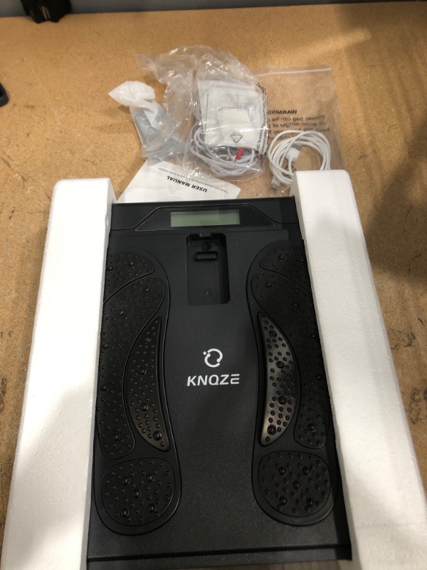 Photo 1 of EMS Foot Massager for Neuropathy, TENS EMS Foot Nerve Circulation Stimulator for Pain Relief, 10 Modes and 50 Intensities, 4 Body Pads, Relieve Swelling, Cramps, Plantar Fasciitis, FSA HSA Eligible