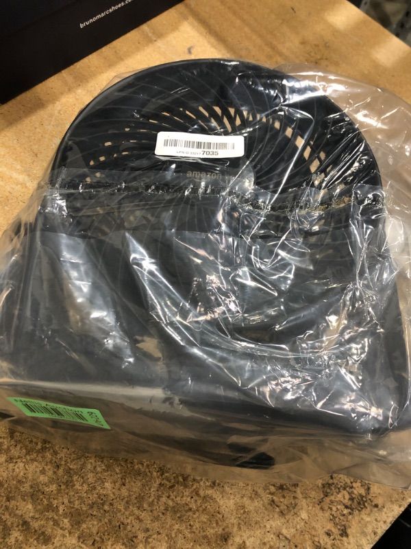 Photo 1 of Amazon Basics Air Circulator Fan, Desk Fan for Bedroom, Home and Office, With 90-Degree Tilt Head, 3 Speed Settings, Lightweight (3 LBS), 35 Watts, Black, 11.1"W x 6.3"D x 10.9"H