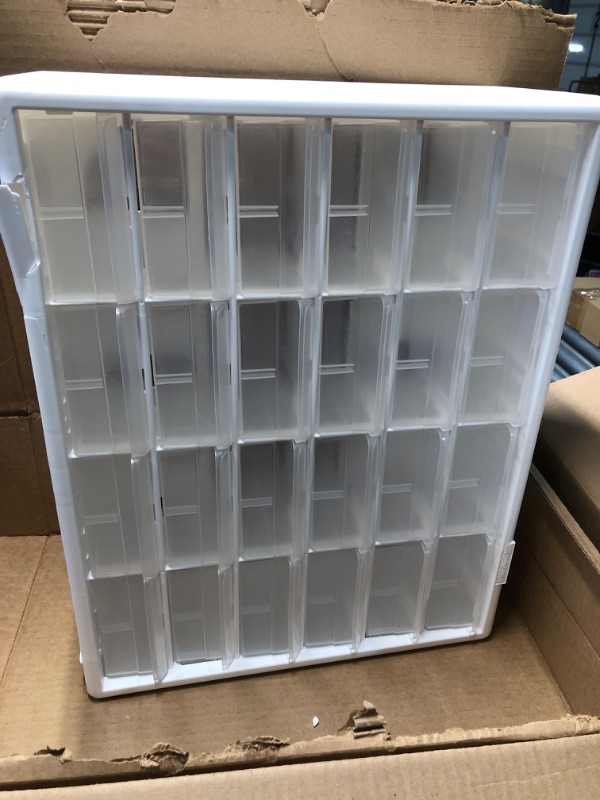 Photo 1 of Akro-Mils 24-Drawer Plastic Drawer Storage Cabinet for Garage Organization, Bead Organizer, Building Bricks Storage, Teacher Toolbox, Makeup Organizer, 20-Inch W x 6-Inch D x 16-Inch H, 10124 White
