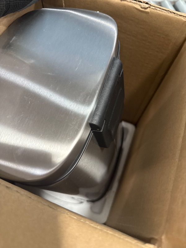 Photo 1 of Amazon Basics Smudge Resistant Mini Rectangular Trash Can with Soft-Close Foot Pedal, Brushed Stainless Steel, for Bathroom & Small Space, 5 l /1.3 gallon, Silver, 7.3x8.5 x11.8 in (LxWxH)
