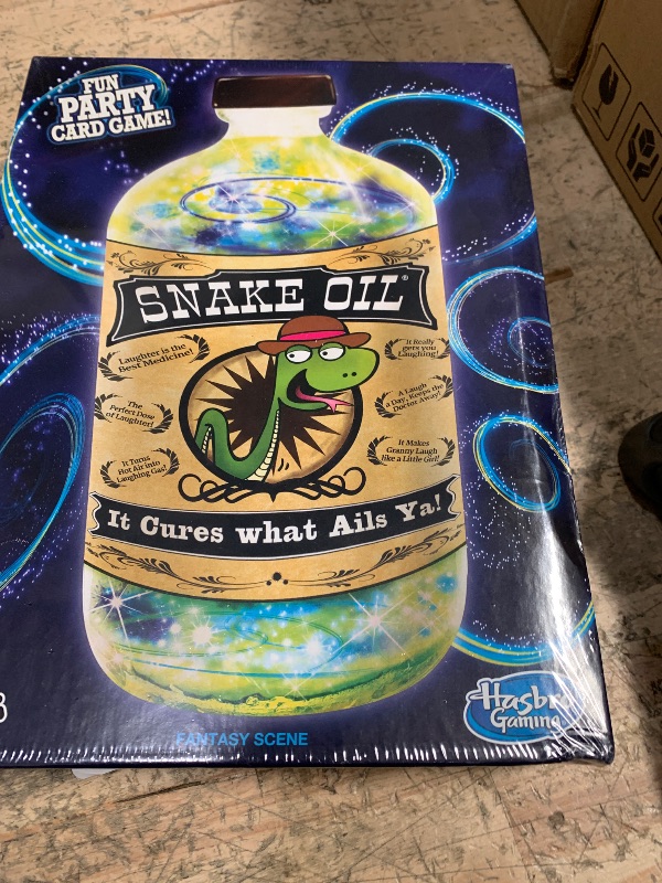 Photo 1 of Hasbro Gaming Snake Oil Game