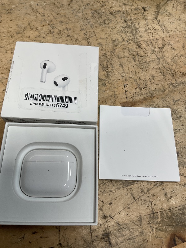Photo 1 of Apple AirPods (3rd Generation) Wireless Ear Buds, Bluetooth Headphones, Personalized Spatial Audio, Sweat and Water Resistant, Lightning Charging Case Included, Up to 30 Hours of Battery Life**MISSING 1/2 EARBUDS **