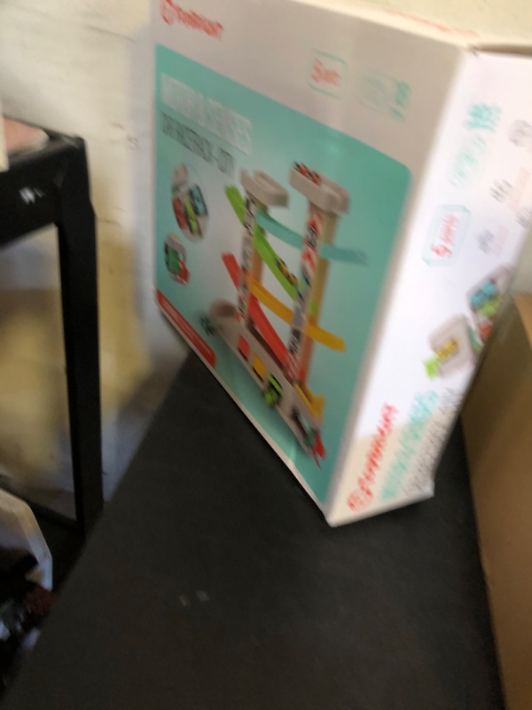 Photo 1 of TOP BRIGHT Car Ramp Toy for 2 3 Year Old Boy Gifts, Toddler Race Track Toy for 18 Month Old with 4 Wooden Cars and 3 Car Garage