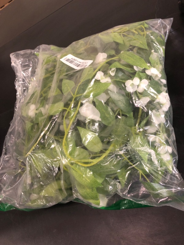 Photo 1 of Uqueeten 2 Pcs 5.8ft Artificial Baby Breath Flower Vines, Babys Breath Artificial Flowers Real Touch Faux Gypsophila Hanging Fake Baby's Breath Garlands for Wedding and Baby Shower Decor?White?