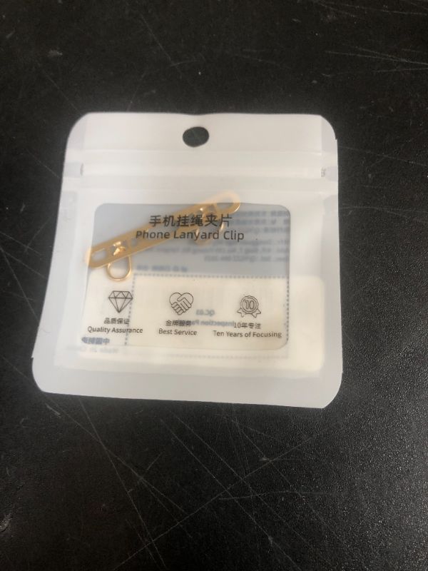 Photo 1 of Metal Phone Tether Tab for iPhone, Cell Phone Lanyard Patch with 2 rings,made of stainless steel, thin and sturdy, does not affect charging, prevents dropping and losing (Champagne Gold+black)