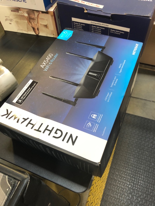 Photo 1 of NETGEAR Nighthawk 6-Stream Dual-Band WiFi 6 Router (RAX54S) – Security Features, AX5400 Wireless Speed, Up to 5.4 Gbps, Covers up to 2,500 sq. ft., 25 Devices - 1-Year Armor Subscription Included