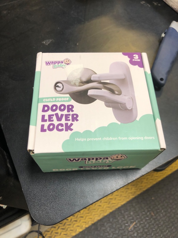 Photo 1 of Door Lever Lock (3 Pack) Prevents Toddlers from Opening Doors. 3.25" L * 1.5" W * 4.5" H Easy One Hand Operation for Adults. Durable ABS with 3M Adhesive Backing. Simple Install, No Tools Needed.