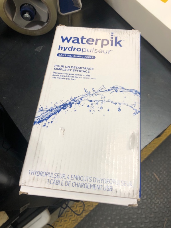 Photo 1 of Waterpik Cordless Pearl Rechargeable Portable Water Flosser for Teeth, Gums, Braces Care and Travel with 4 Flossing Tips - ADA Accepted, WF-13 White, Packaging May Vary