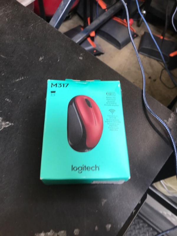 Photo 1 of Logitech M317 Wireless Mouse, 2.4 GHz with USB Receiver, 1000 DPI Optical Tracking, 12 Month Battery, Compatible with PC, Mac, Laptop, Chromebook - Red