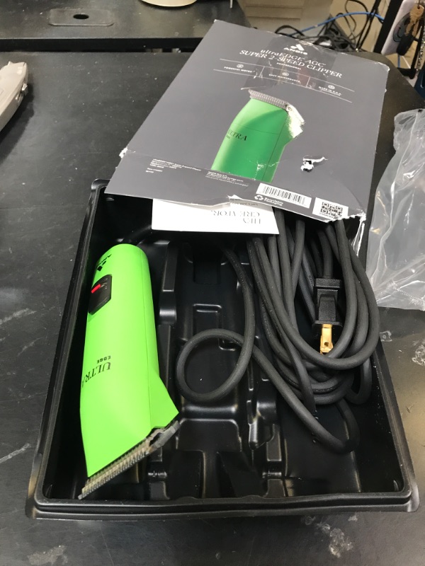 Photo 1 of Andis 24715 Professional UltraEdge Super 2-Speed Detachable Blade Clipper – Rotary Motor with Shatter-Proof Housing, Runs Calm & Silent, 14-Inch Cord - for All Coats & Breeds - 120 Volts, Green