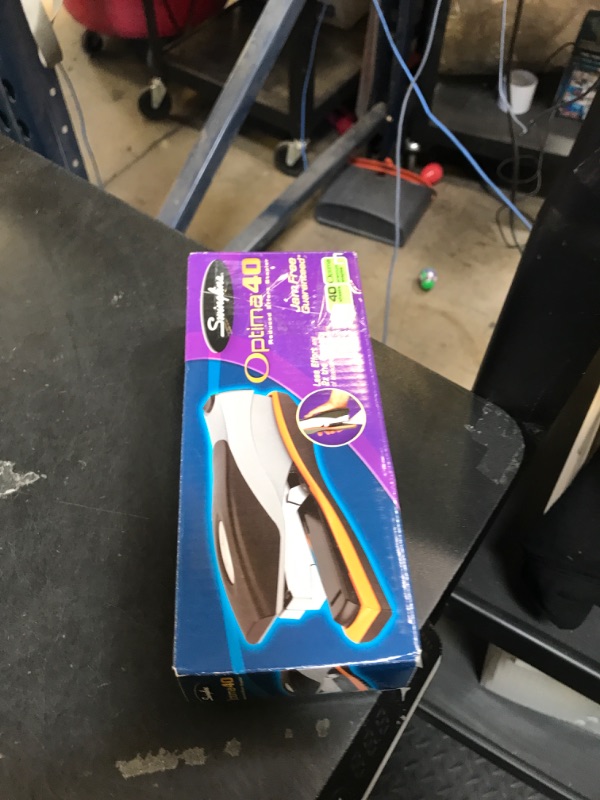 Photo 1 of Swingline Stapler, 40 Sheet Capacity, Optima 40, Jam Free, Reduced Effort, Soft Grip, Metal, Orange and Gray (87845)