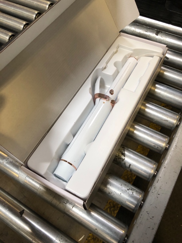 Photo 1 of T3 SinglePass Curl X Extra-Long Barrel Curling Iron with 9 Heat Settings and Ceramic Barrel for Fast Styling and Lasting Results on All Hair Types