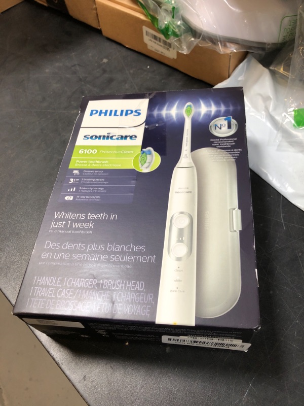 Photo 1 of PHILIPS Sonicare ProtectiveClean 6100 Rechargeable Electric Toothbrush, with Pressure Sensor, 3 Cleaning Modes, SmarTimer and QuadPacer, 14-Day Battery Life, Travel Case, White, Model HX6877/21