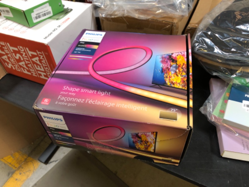 Photo 1 of Philips Hue 75" Smart TV Light Strip - White and Color Ambiance LED Color-Changing TV Backlight - Sync with TV, Music, and Gaming - Requires Bridge and Sync Box - Control with App or Voice Assistant