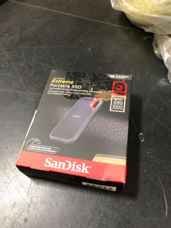Photo 1 of SanDisk 2TB Extreme Portable SSD - Up to 1050MB/s, USB-C, USB 3.2 Gen 2, IP65 Water and Dust Resistance, Updated Firmware - External Solid State Drive - SDSSDE61-2T00-G25