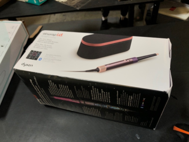 Photo 1 of Limited Edition Dyson Airwrap i.d.™ Multi-Styler and Dryer Straight+Wavy in Jasper Plum
