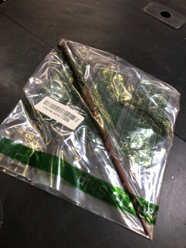 Photo 1 of Wizarding World Harry Potter, 12-inch Spellbinding Harry Potter Wand with Collectible Spell Card, Kids Toys for Ages 6 and up