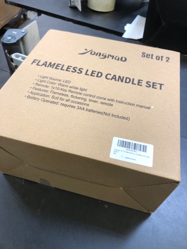 Photo 1 of Yongmao 10" x 5" Waterproof Outdoor Flameless Candles Battery Operated LED Flickering Pillar Candles with Remote and Timer for Indoor Outdoor Lanterns, Long Lasting, Ivory White Large, Set of 2