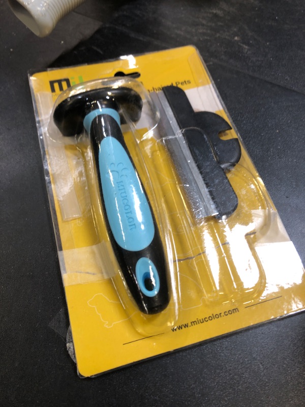 Photo 1 of MIU COLOR Long Hair Pet Grooming Brush, Deshedding Tool for Medium and Large Dogs & Cats, Effectively Reduces Shedding by up to 95% for Pet Hair, Blue