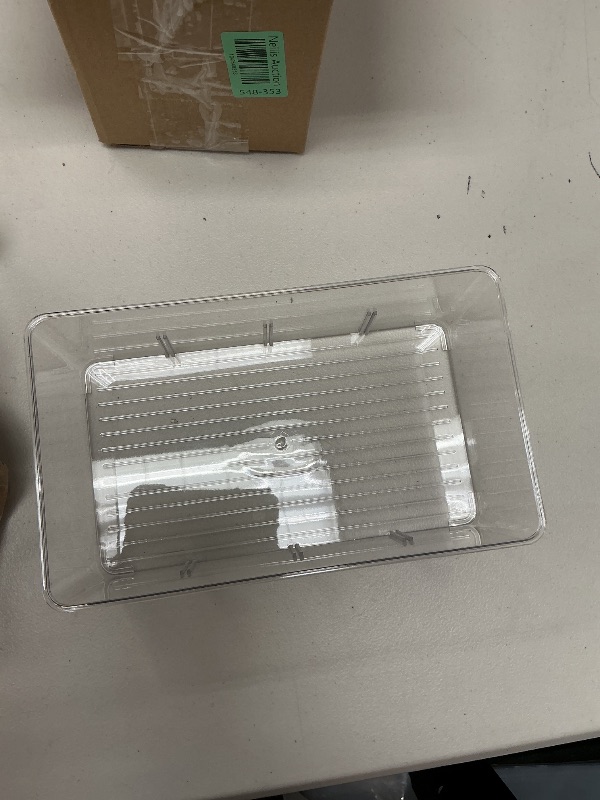Photo 1 of Clear plastic bin 